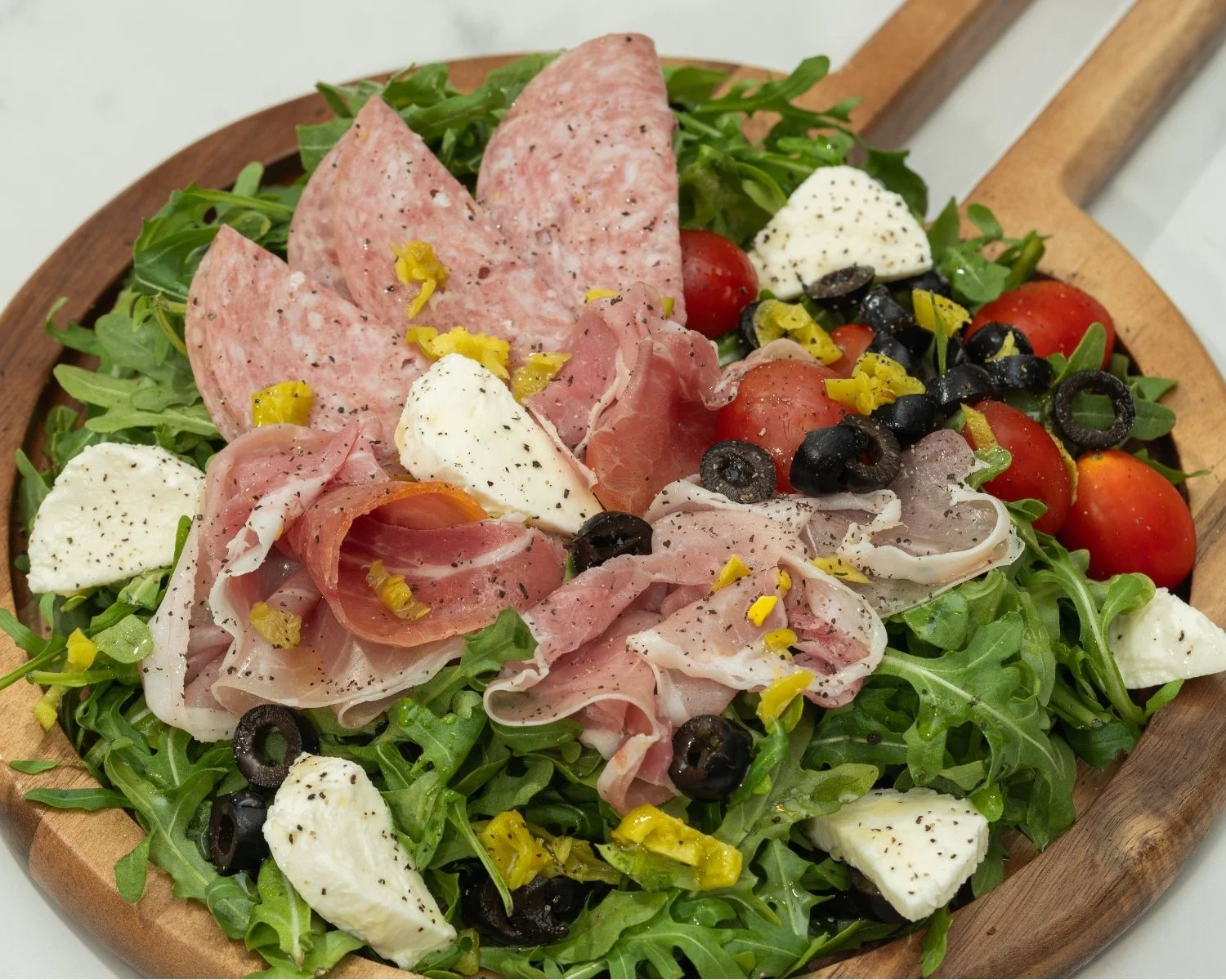 Italian antipasto salad with cured meats and fresh mozzarella