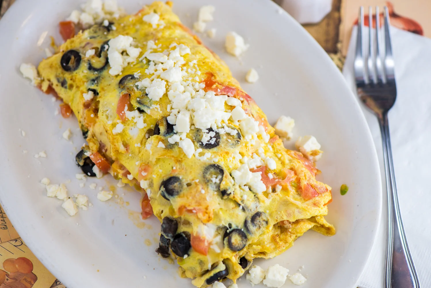Mexican omelette topped with feta cheese