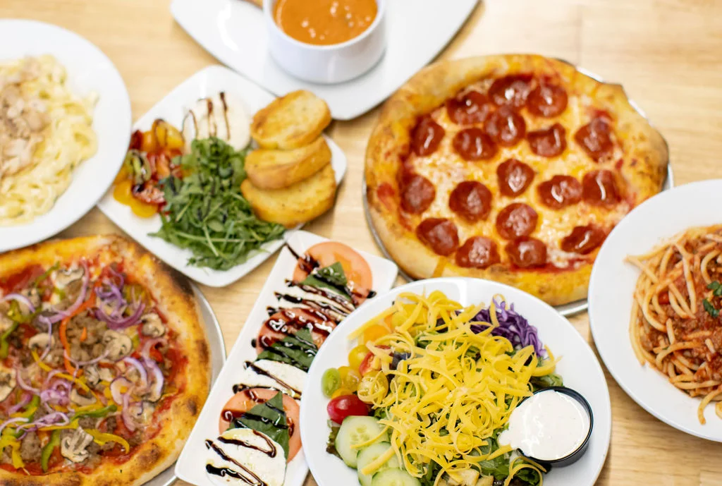 Variety of Italian dishes including pepperoni pizza and pasta