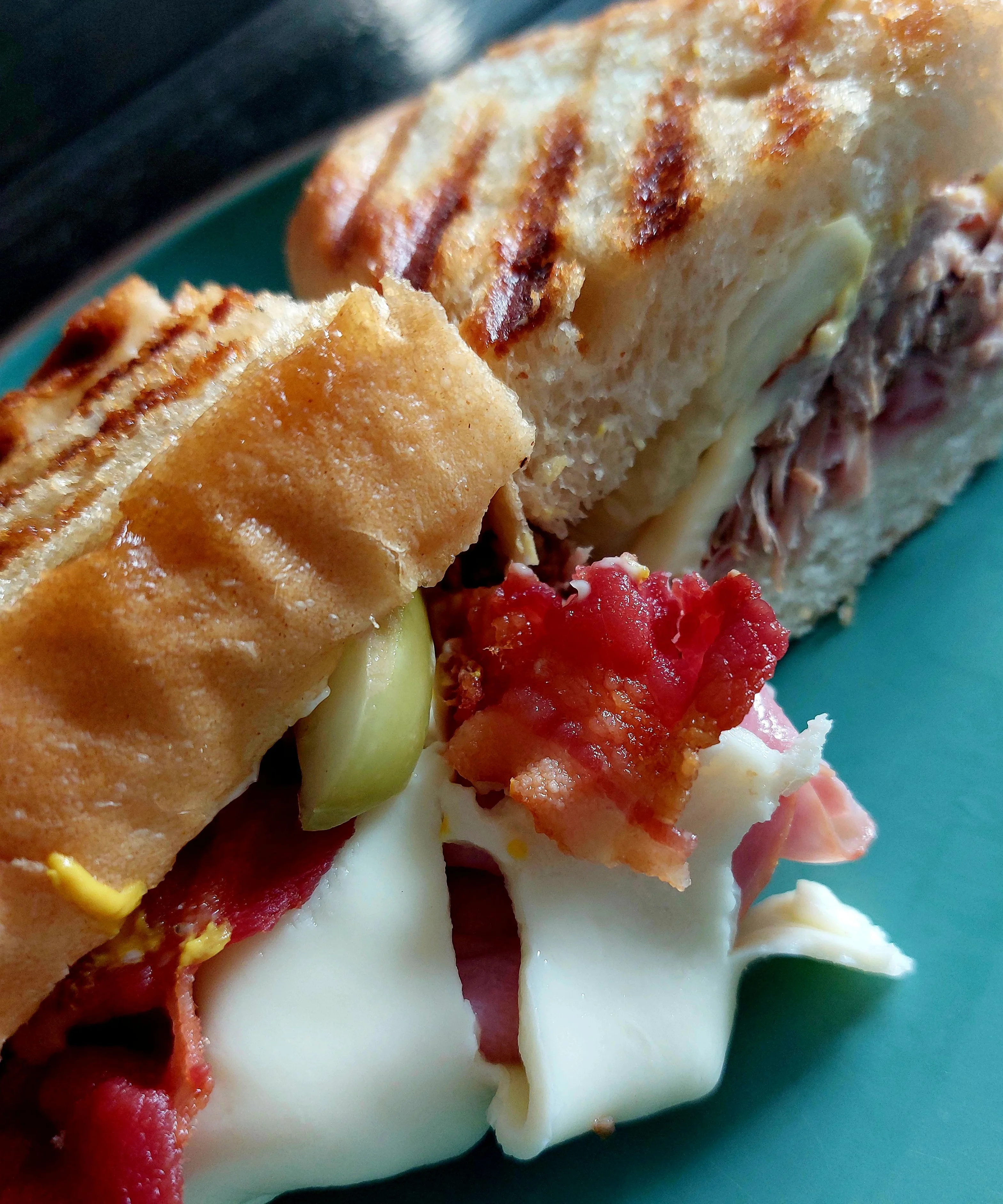 Grilled Cuban sandwich with ham and bacon