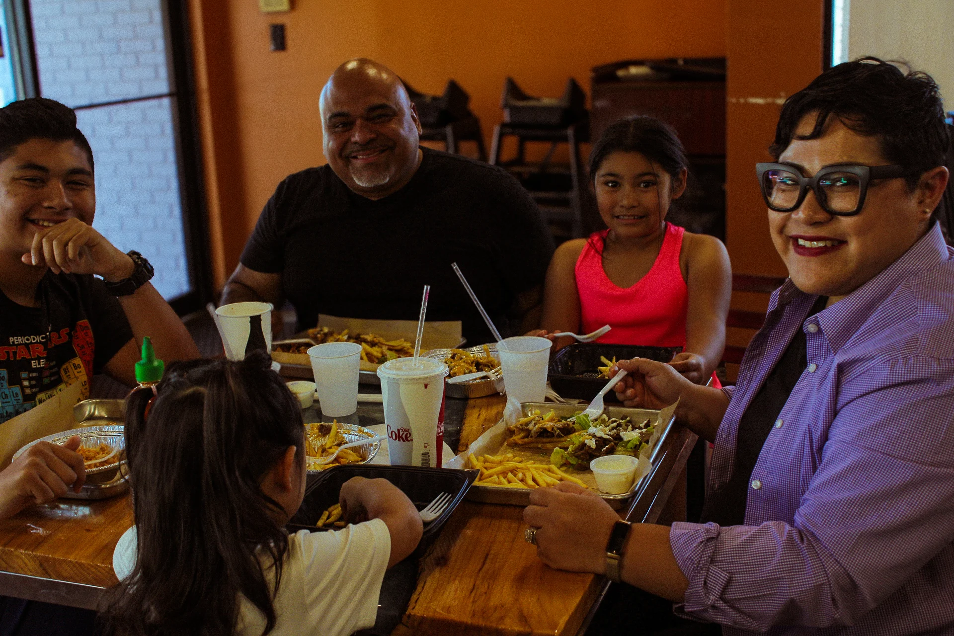 A family eating various mediterranean dishes