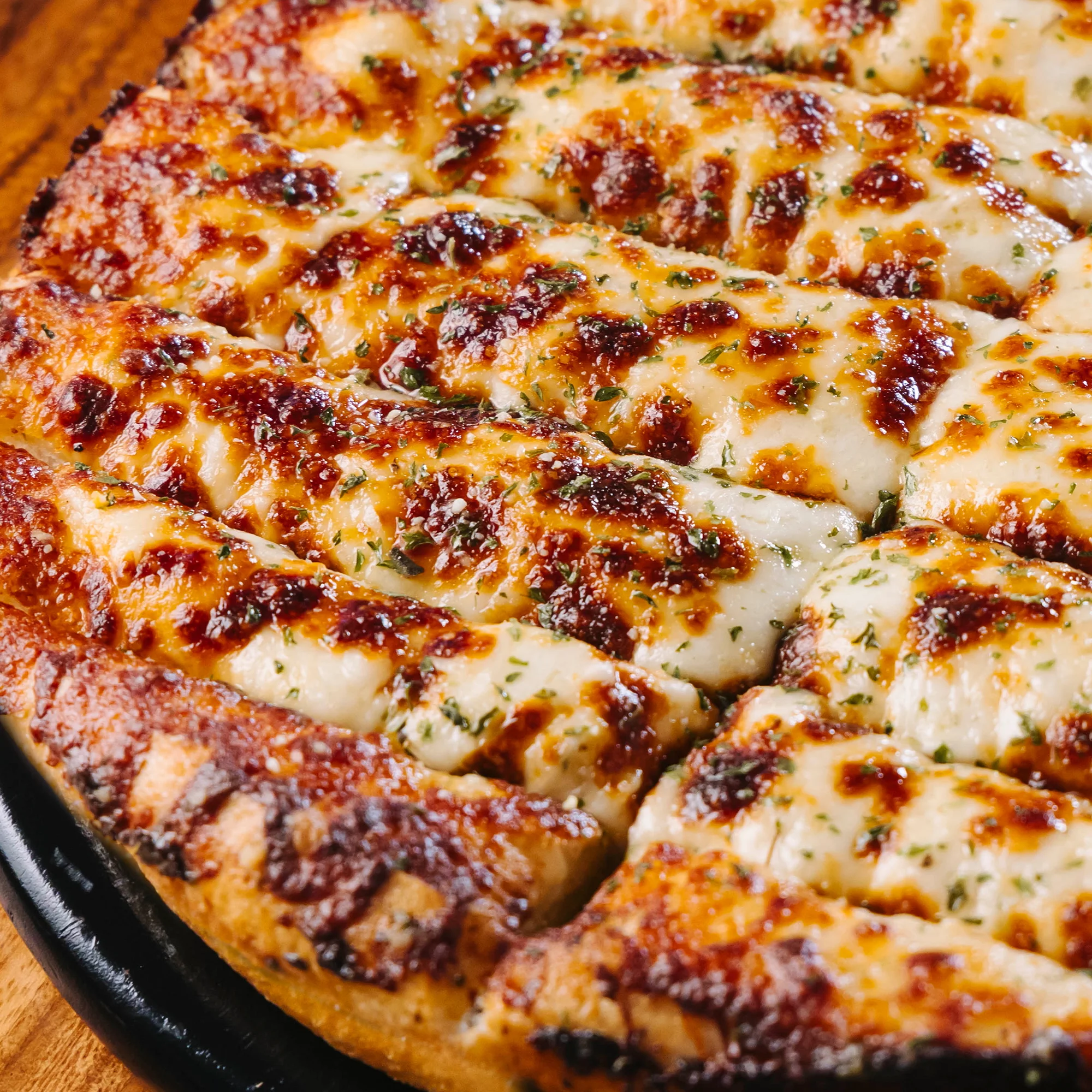 Cheesy garlic breadsticks from an Italian pizzeria