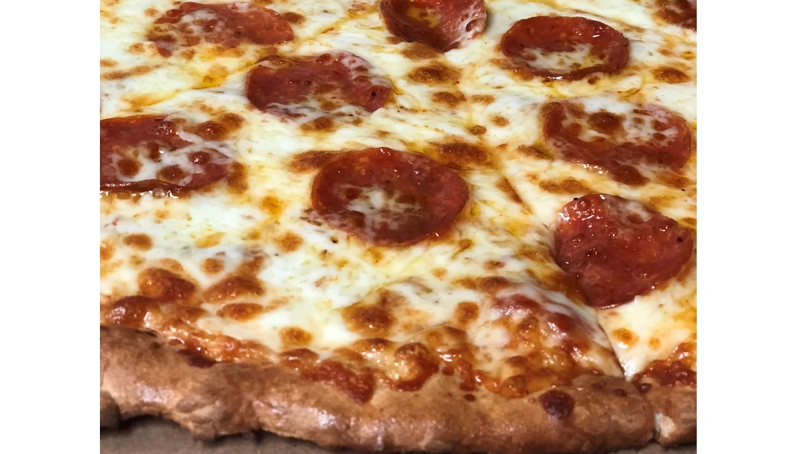 Pepperoni pizza with melted cheese and golden crust