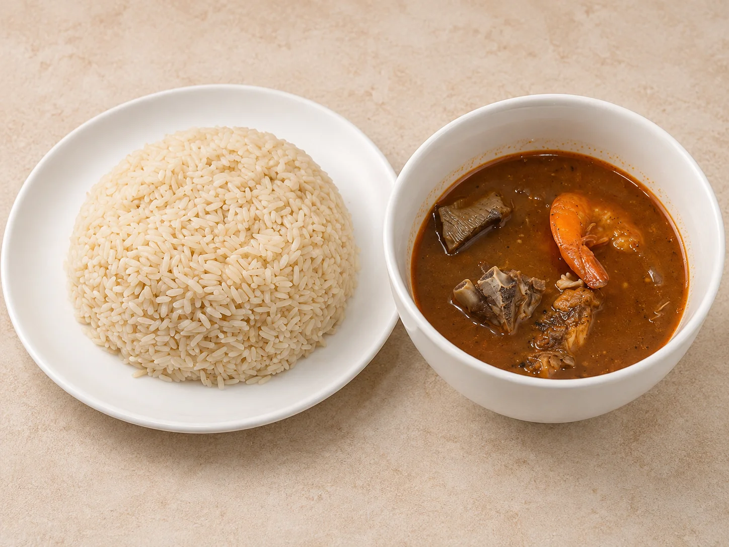 A bowl of rice paired with a spicy seafood stew containing shrimp and other seafood in a rich sauce.