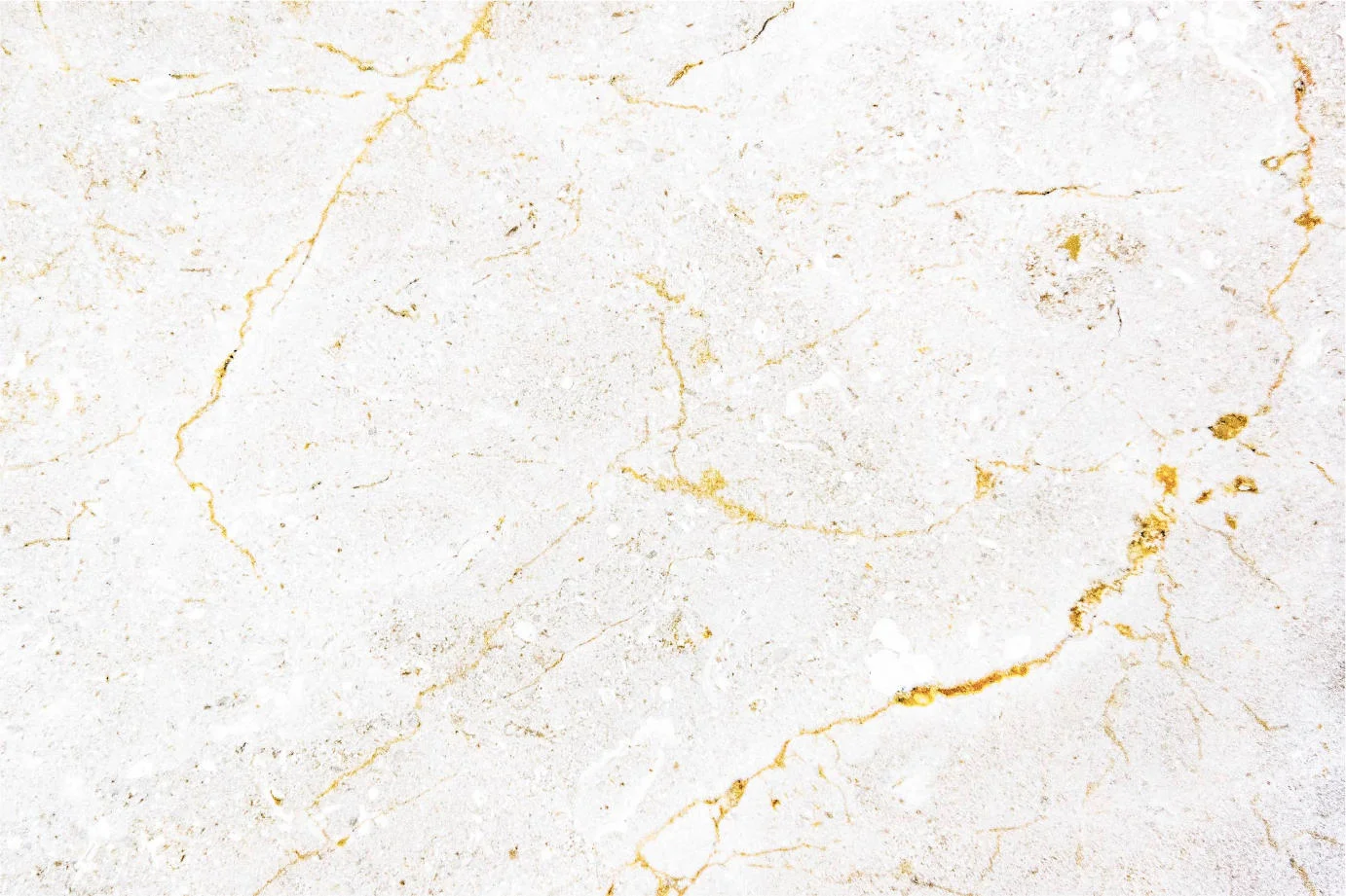 Elegant white marble surface with golden veining