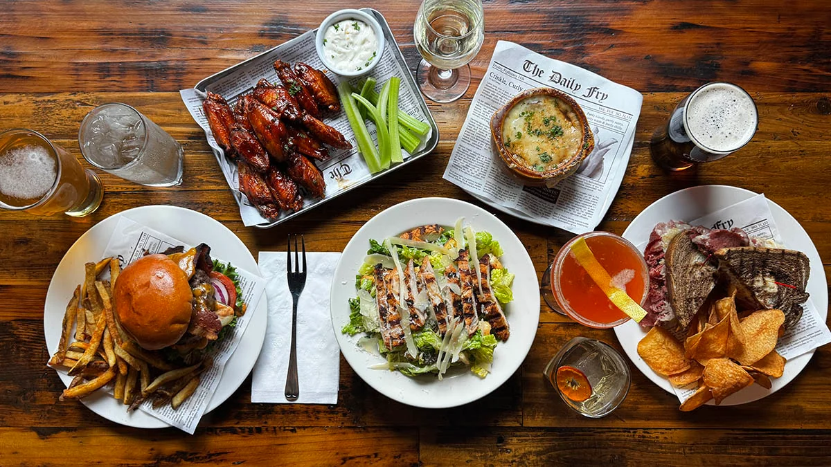 Assorted American pub food including wings and burgers