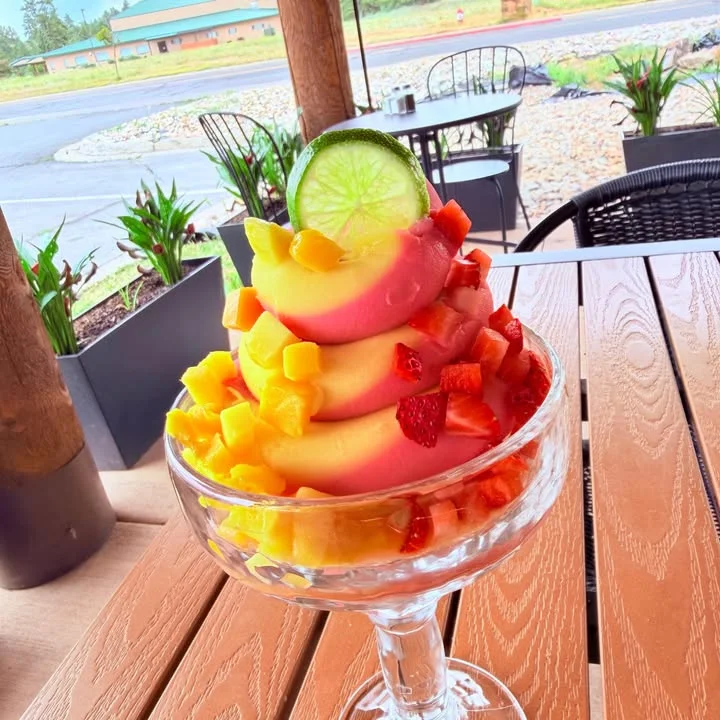 Colorful fruit parfait with tropical flavors