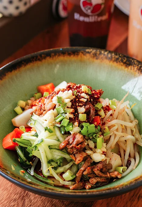 Thai salad with grilled meat and fresh vegetables