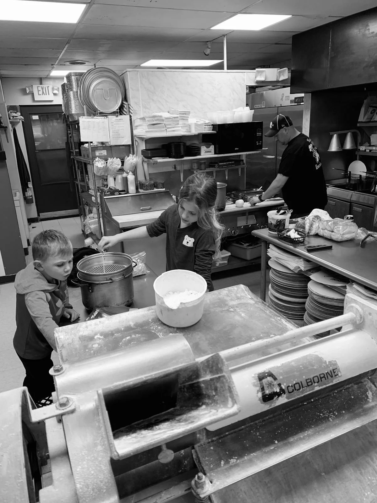 A restaurant chef preparing a dish
