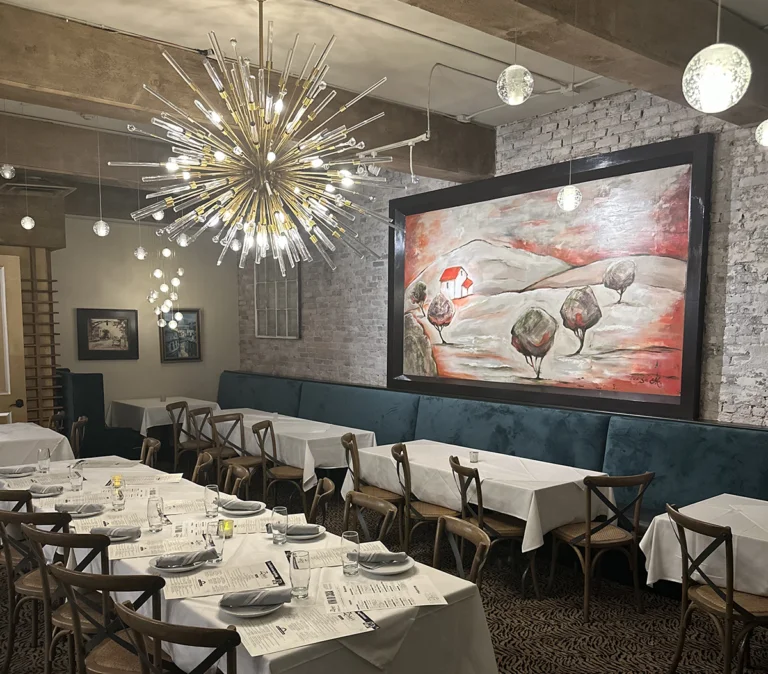 Cozy restaurant interior with modern lighting and artistic decor