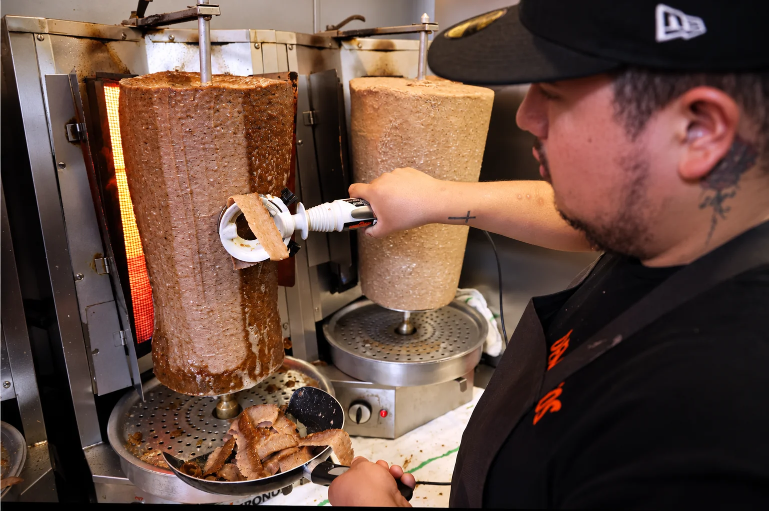 Gyro carving in a restaurant kitchen