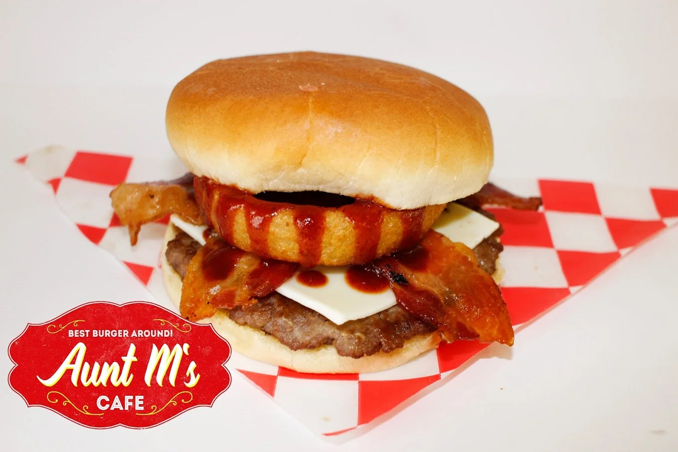 Hearty American burger with bacon and barbecue sauce