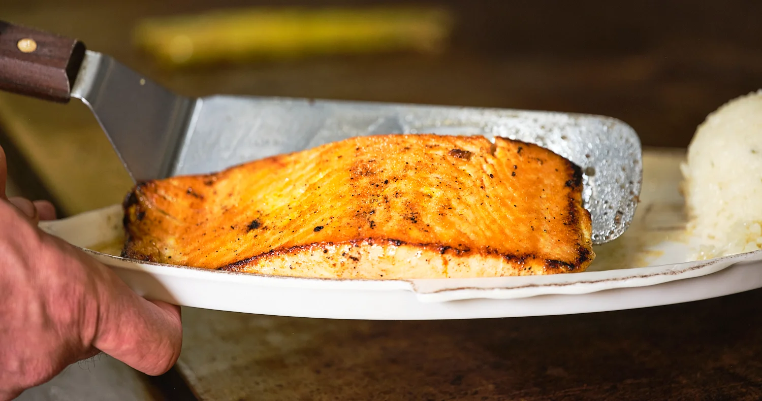 Grilled salmon fillet served with rice