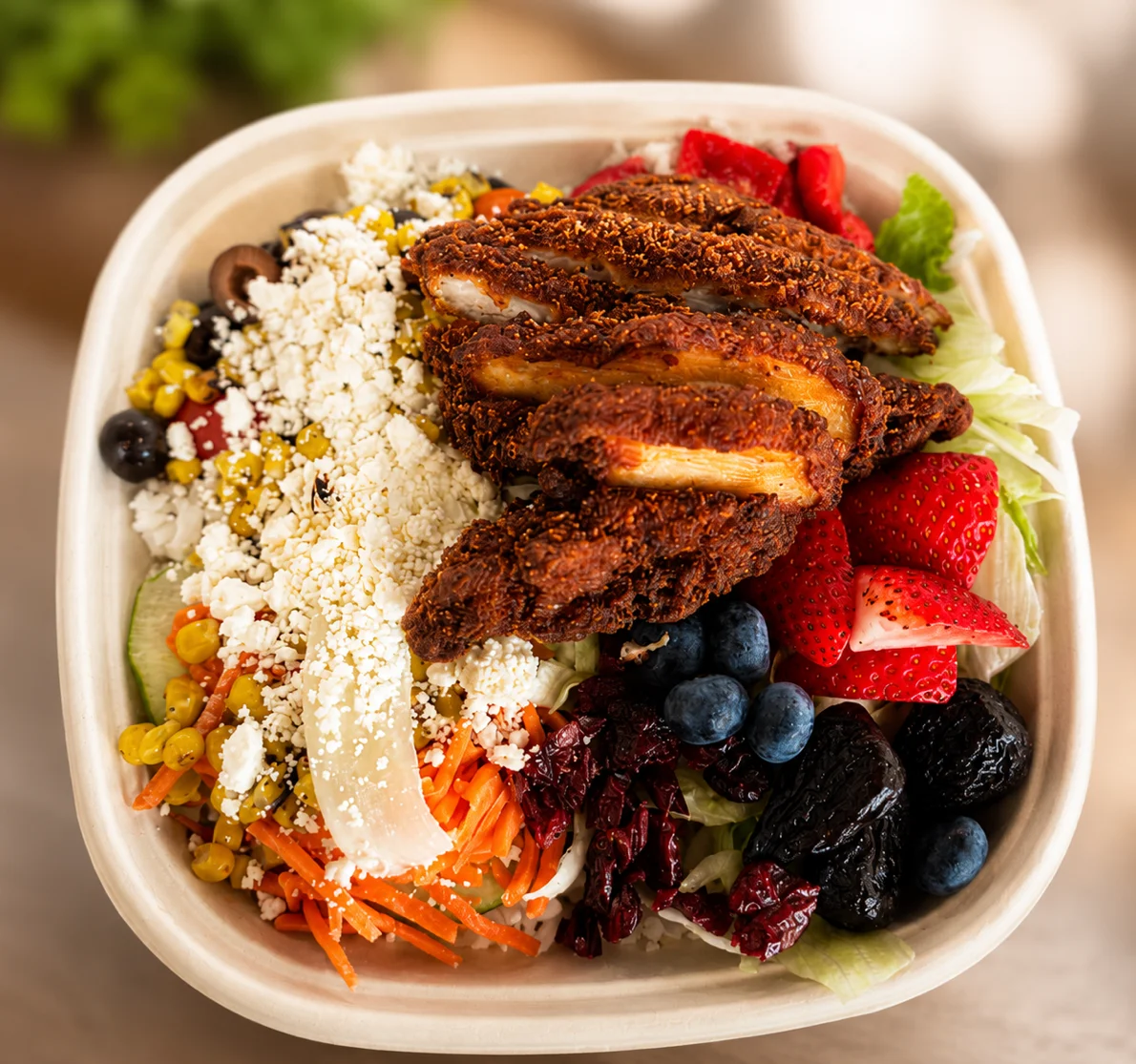 Colorful Mexican burrito bowl with grilled chicken