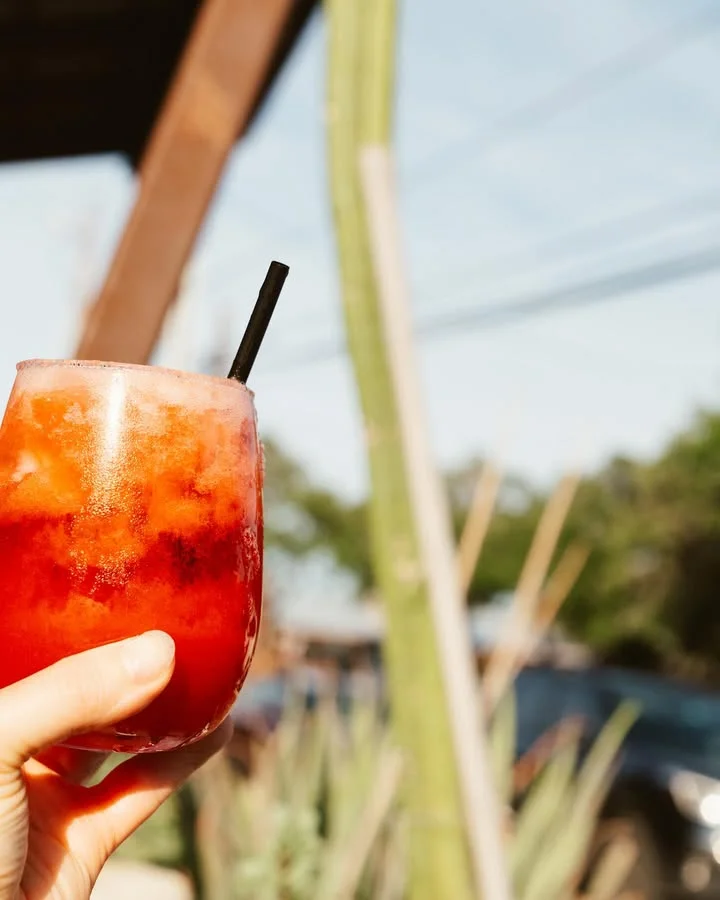Refreshing cocktail served outdoors on a sunny day