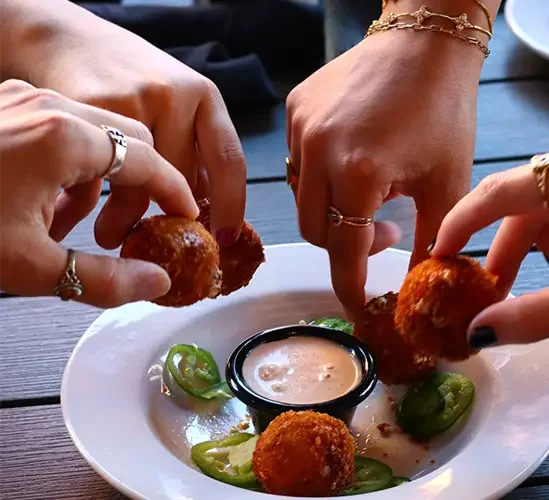 Crispy Southern hush puppies with dipping sauce