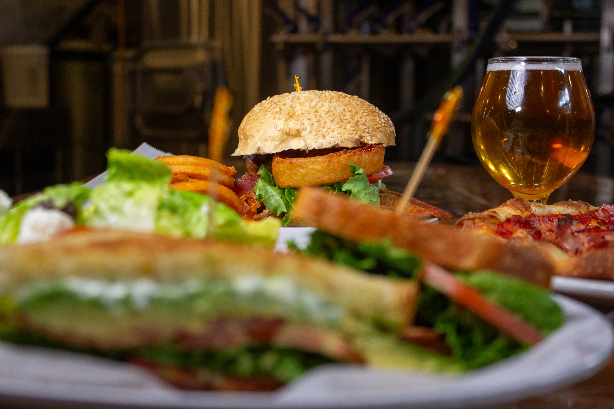 Juicy American cheeseburger with crispy fries and craft beer