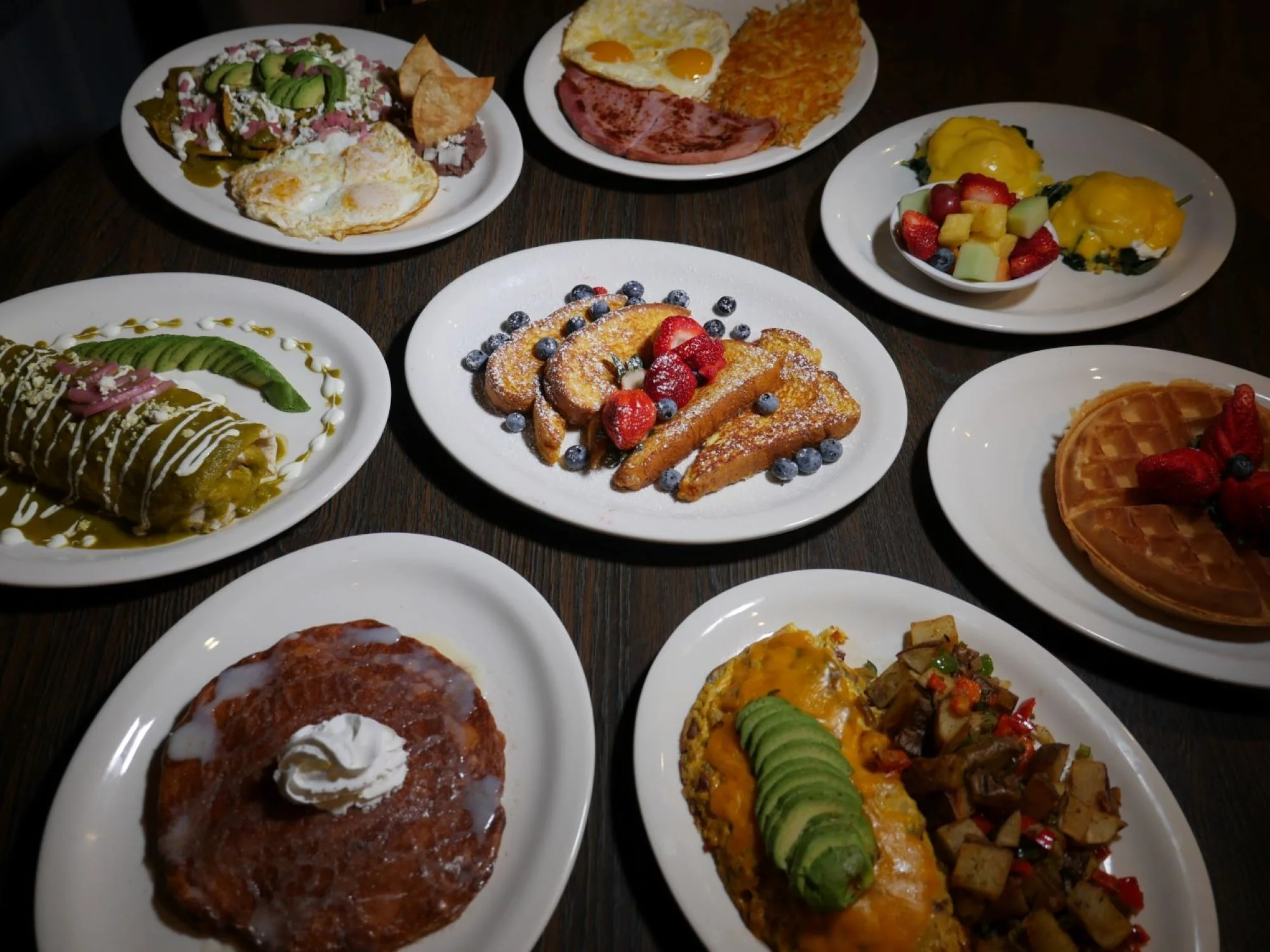 Delicious Mexican breakfast platter with enchiladas and huevos rancheros