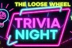 Trivia night event at The Loose Wheel with neon signage