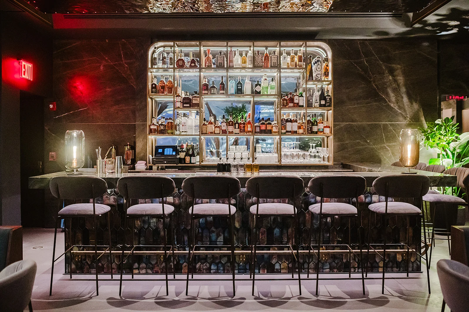 Stylish bar interior with a well-stocked liquor display