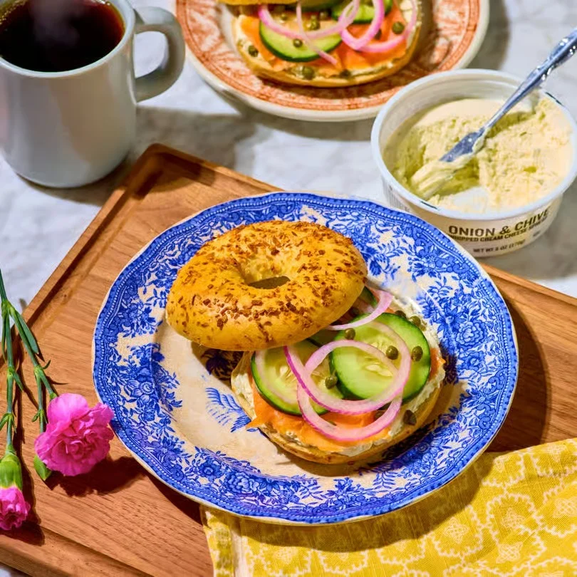 Delicious gourmet burger with fresh toppings on a wooden table