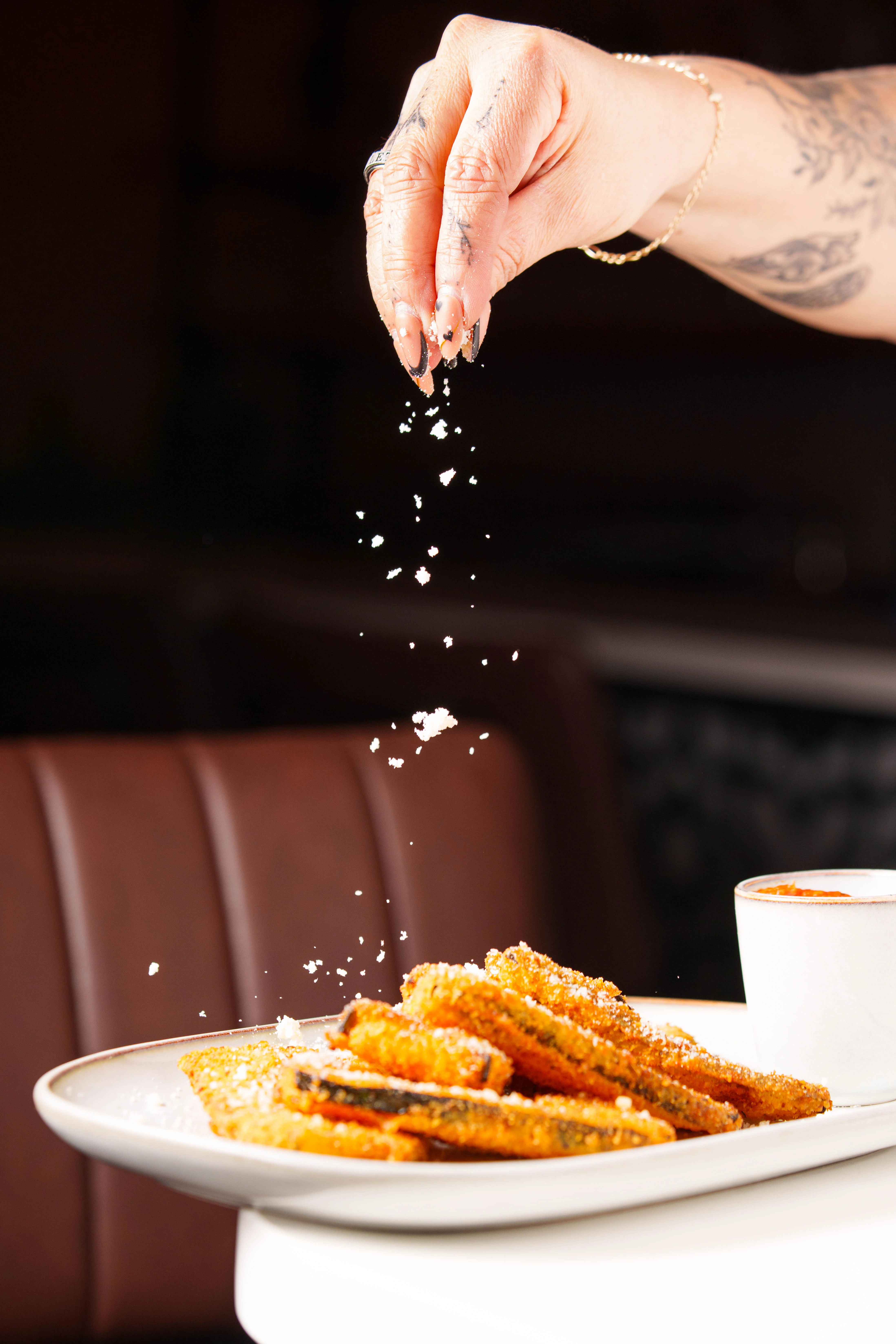 Crispy churros dusted with sugar and served with chocolate sauce