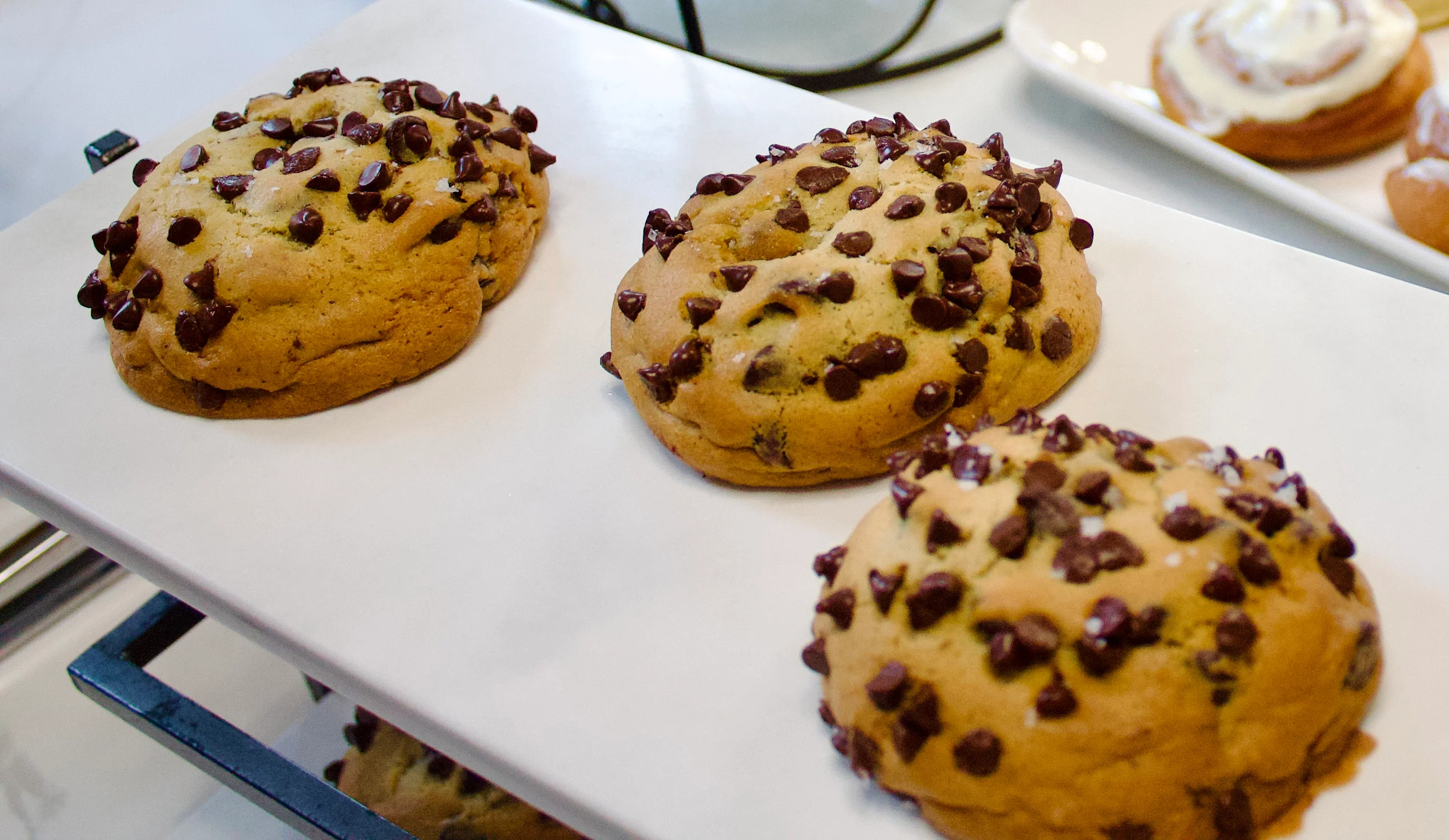 Freshly baked chocolate chip cookies on a serving platter