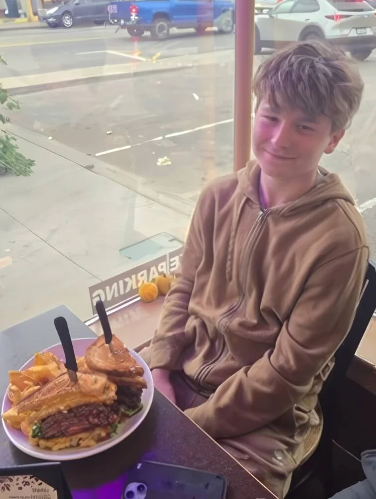Delicious burgers with fries in a cozy restaurant setting
