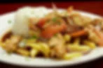 Peruvian lomo saltado with rice and fries