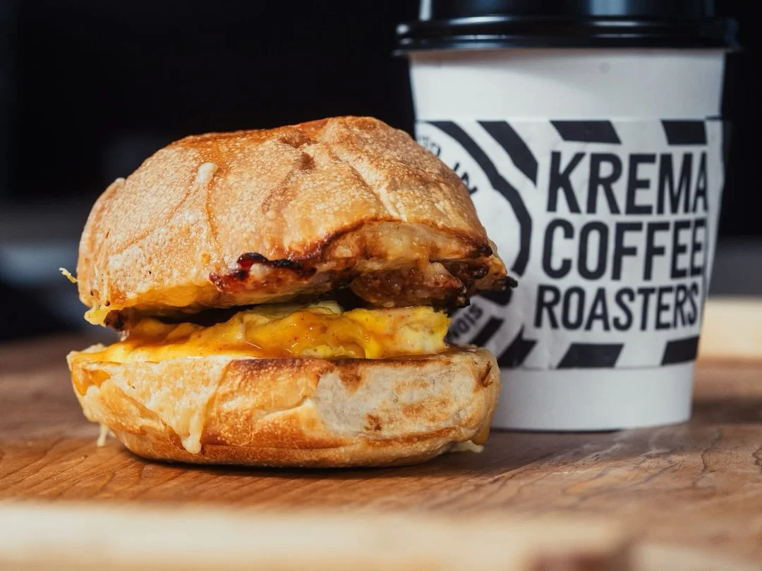 Breakfast sandwich with egg and cheese on a toasted bun