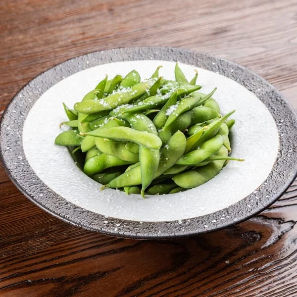 Japanese edamame served in a decorative bowl with sea salt