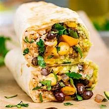 Vegetarian burrito filled with fresh ingredients