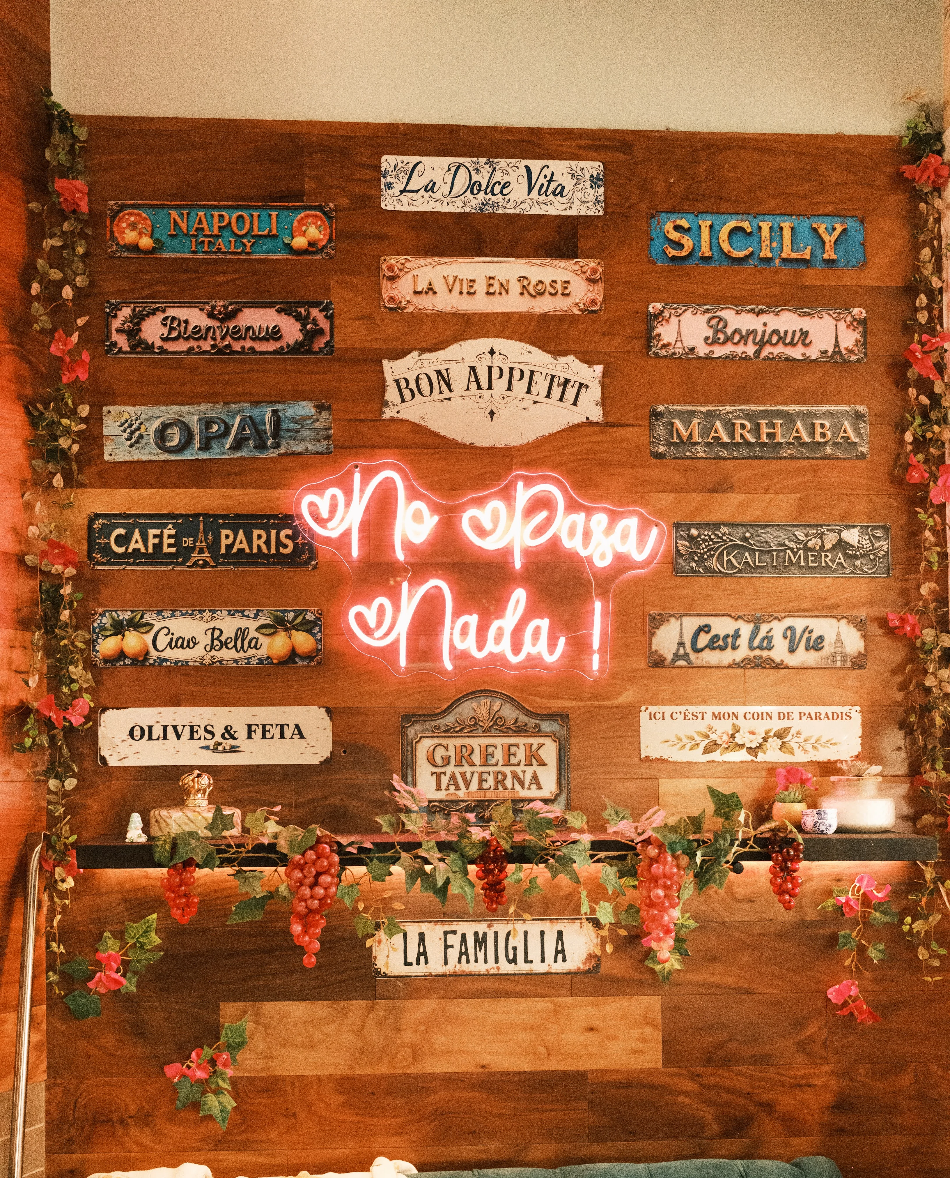 Cozy restaurant wall with vibrant signage and neon decor
