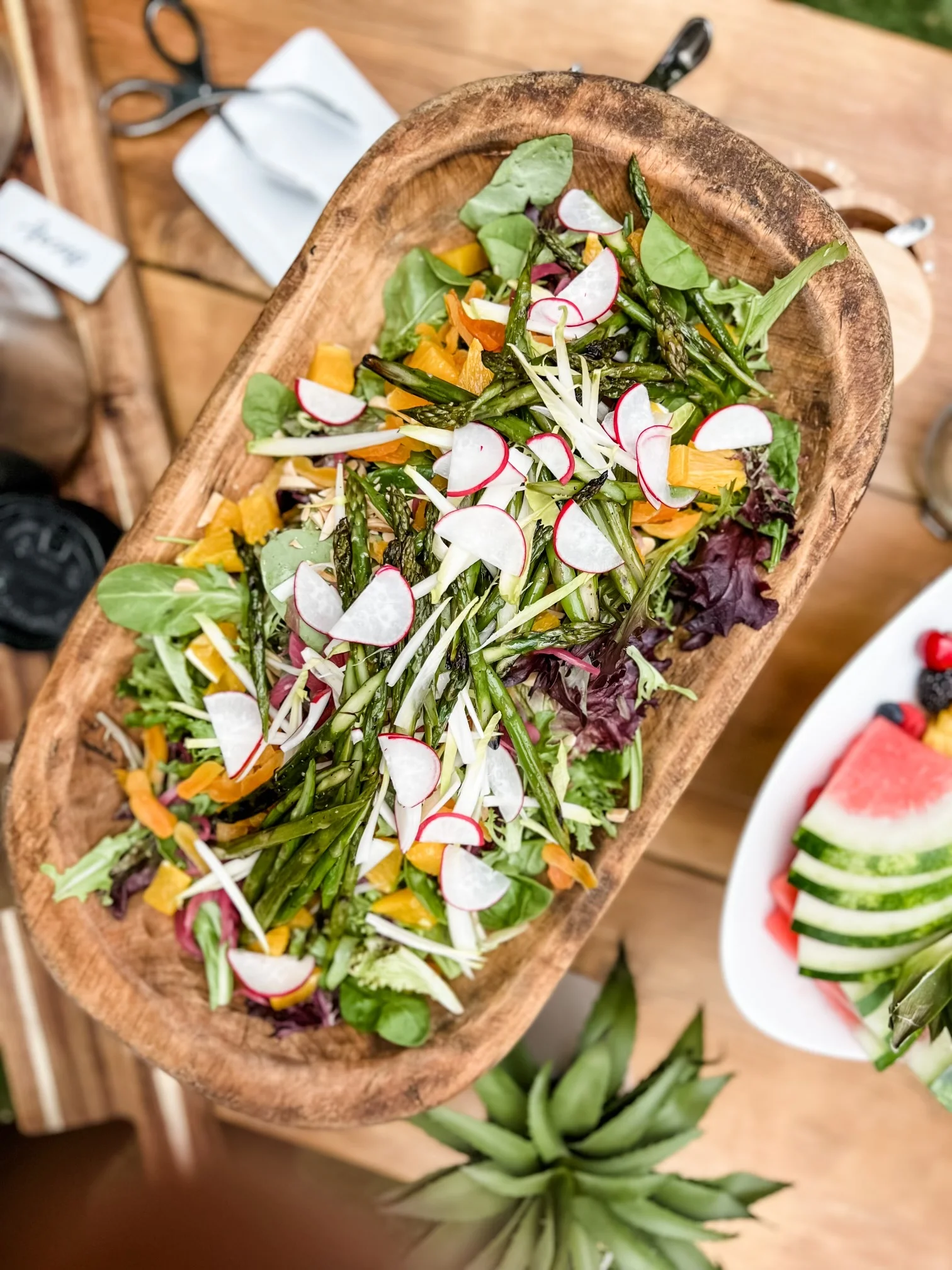 Fresh garden salad with asparagus and radishes