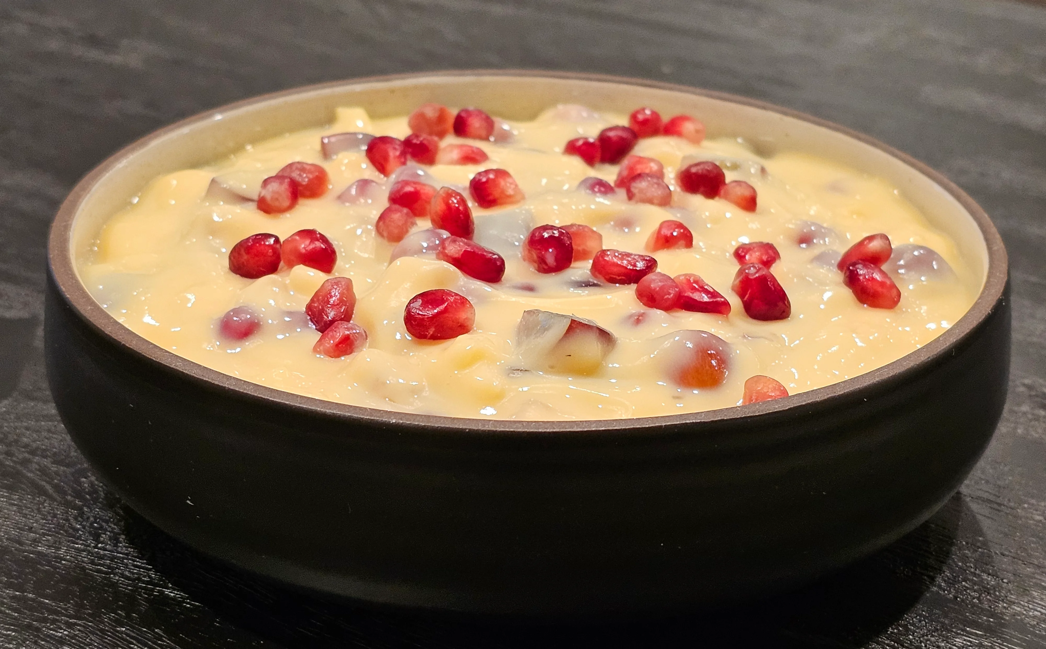 Delicious Indian kheer topped with pomegranate seeds