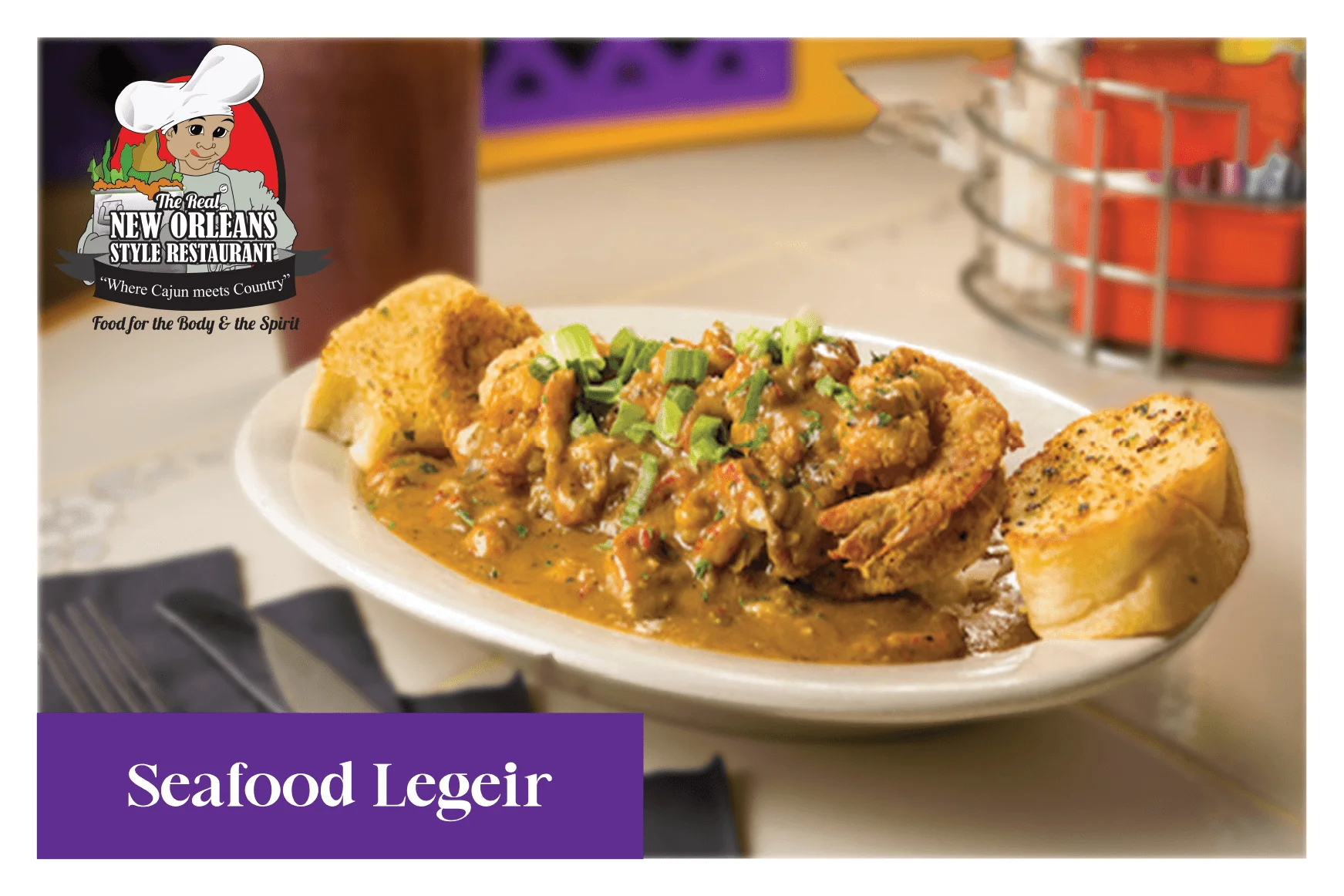 Cajun seafood legeir served with garlic bread
