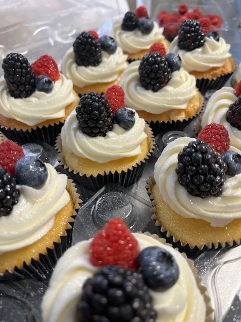 Delicious berry-topped vanilla cupcakes
