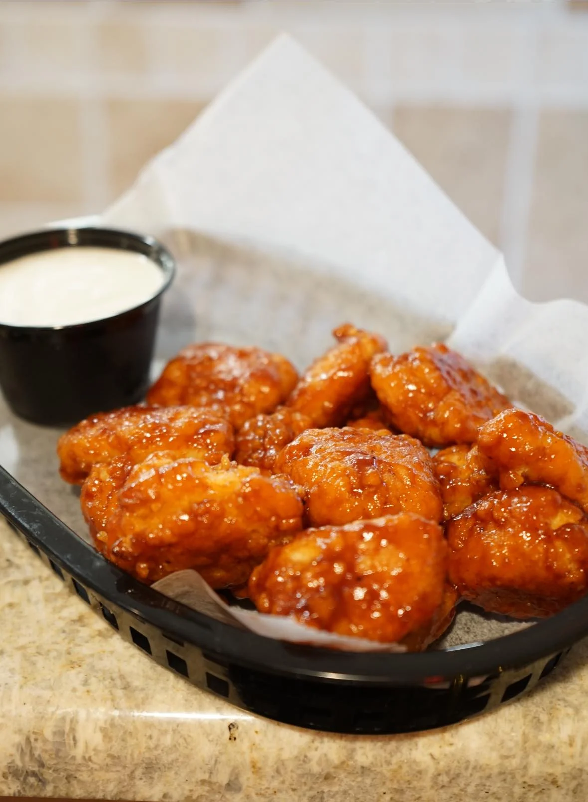 Crispy buffalo chicken wings with ranch dipping sauce