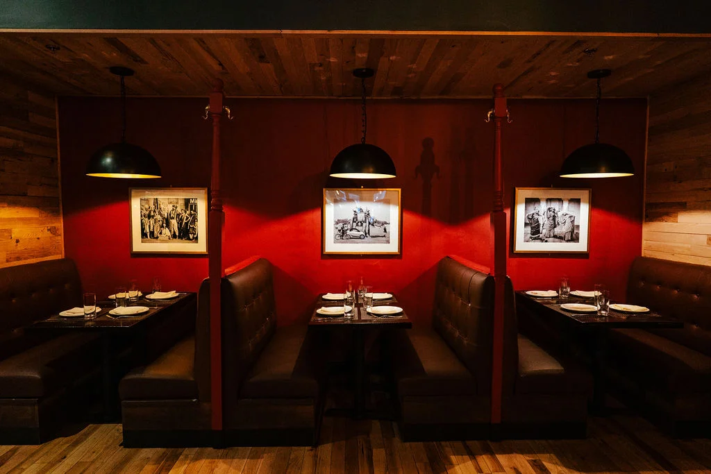 Cozy restaurant interior with wooden accents and framed artwork