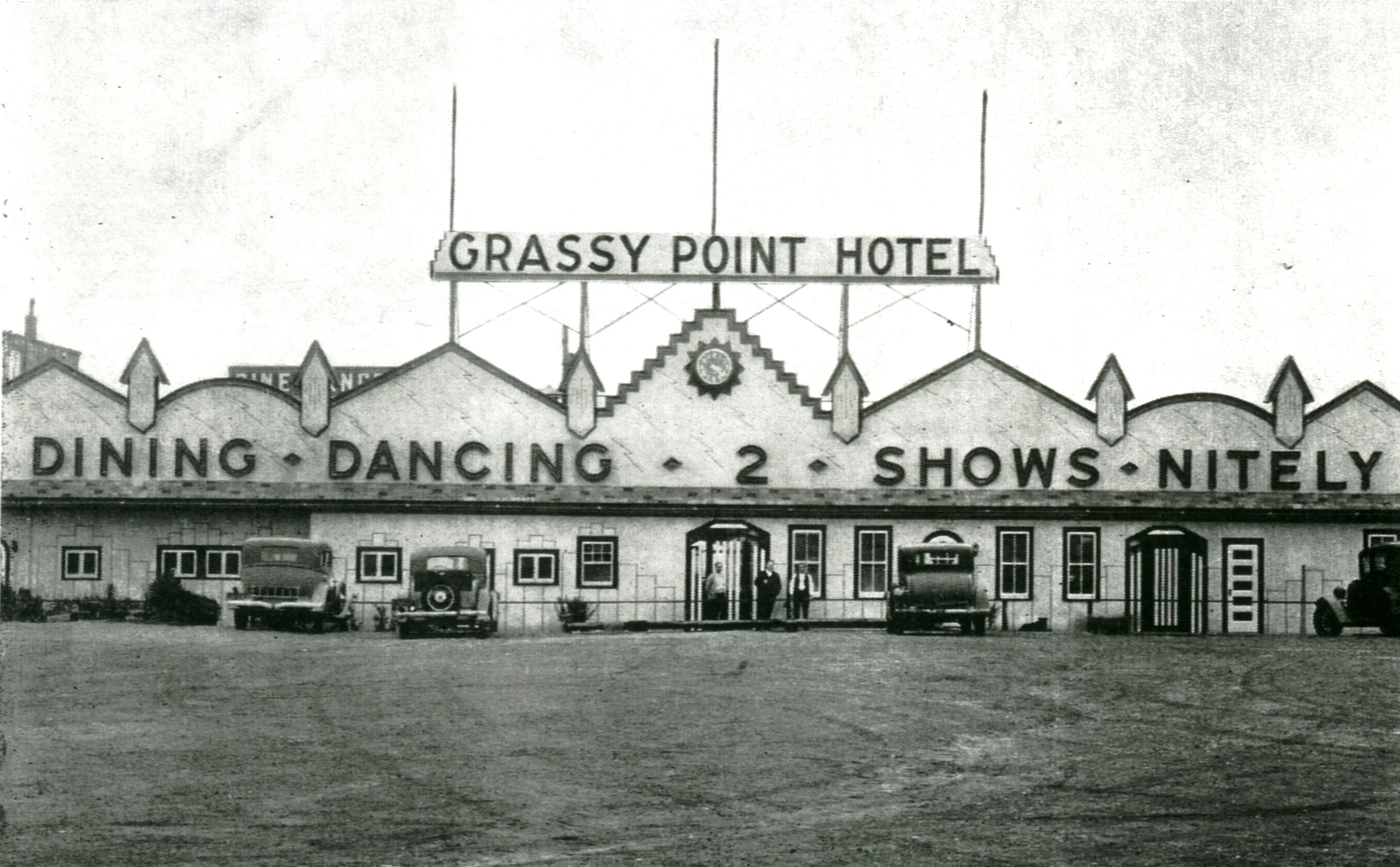 Historic Grassy Point Hotel with dining and dancing signage