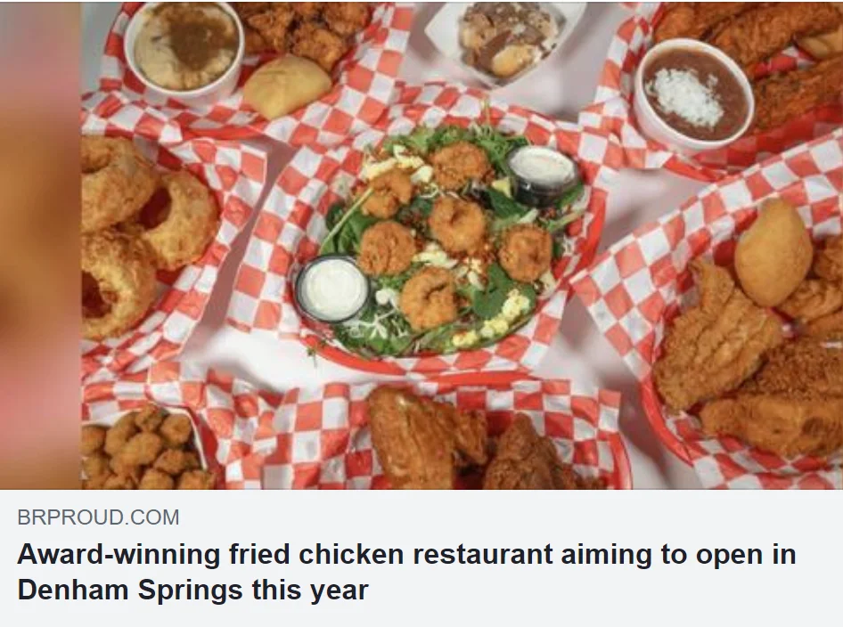 Fried chicken platter with sides in a vibrant restaurant setting
