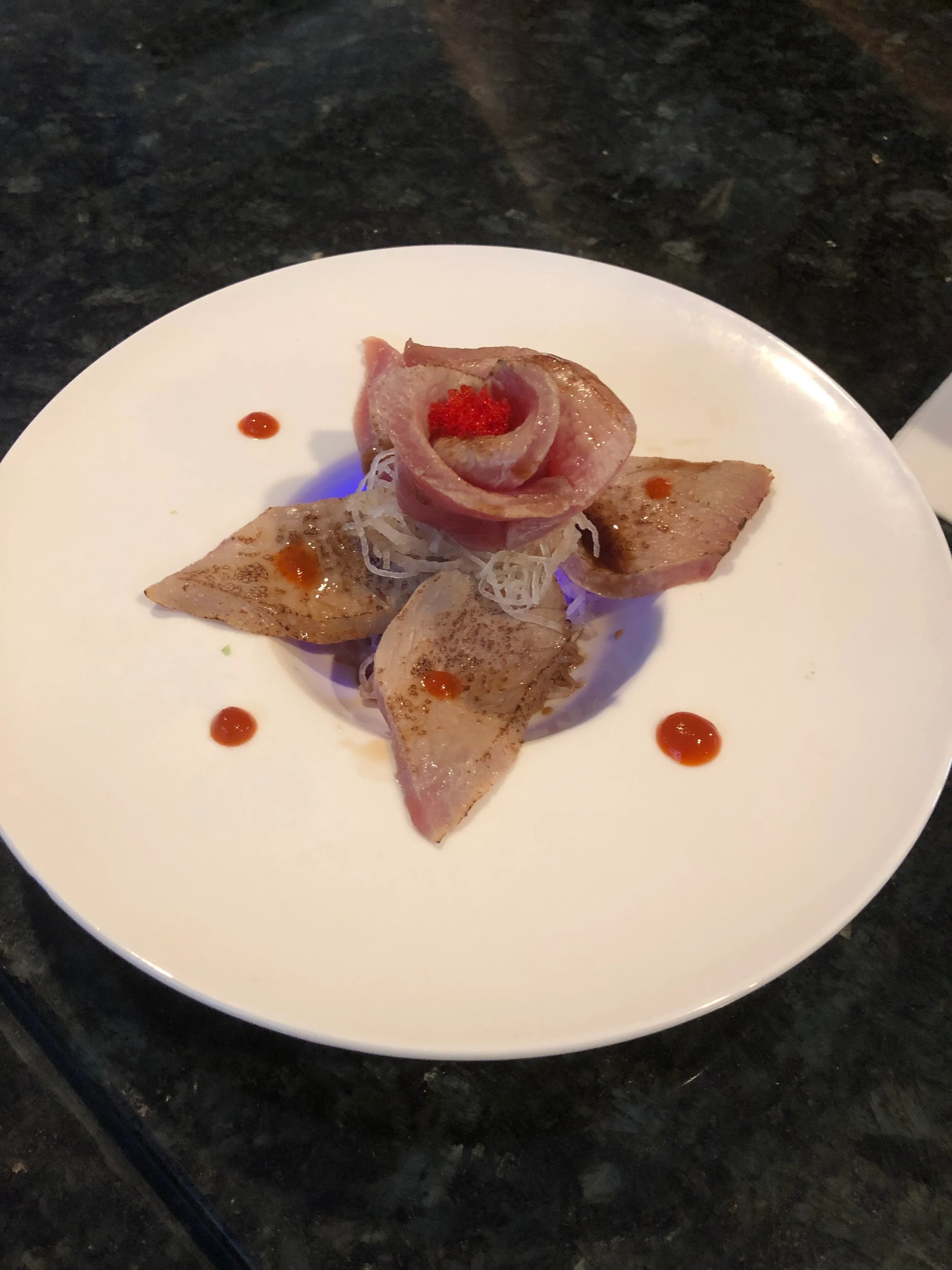 Japanese sashimi platter with artistic presentation