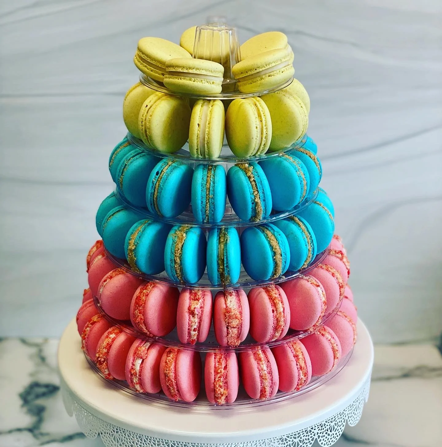 Colorful French macarons arranged in a decorative tower