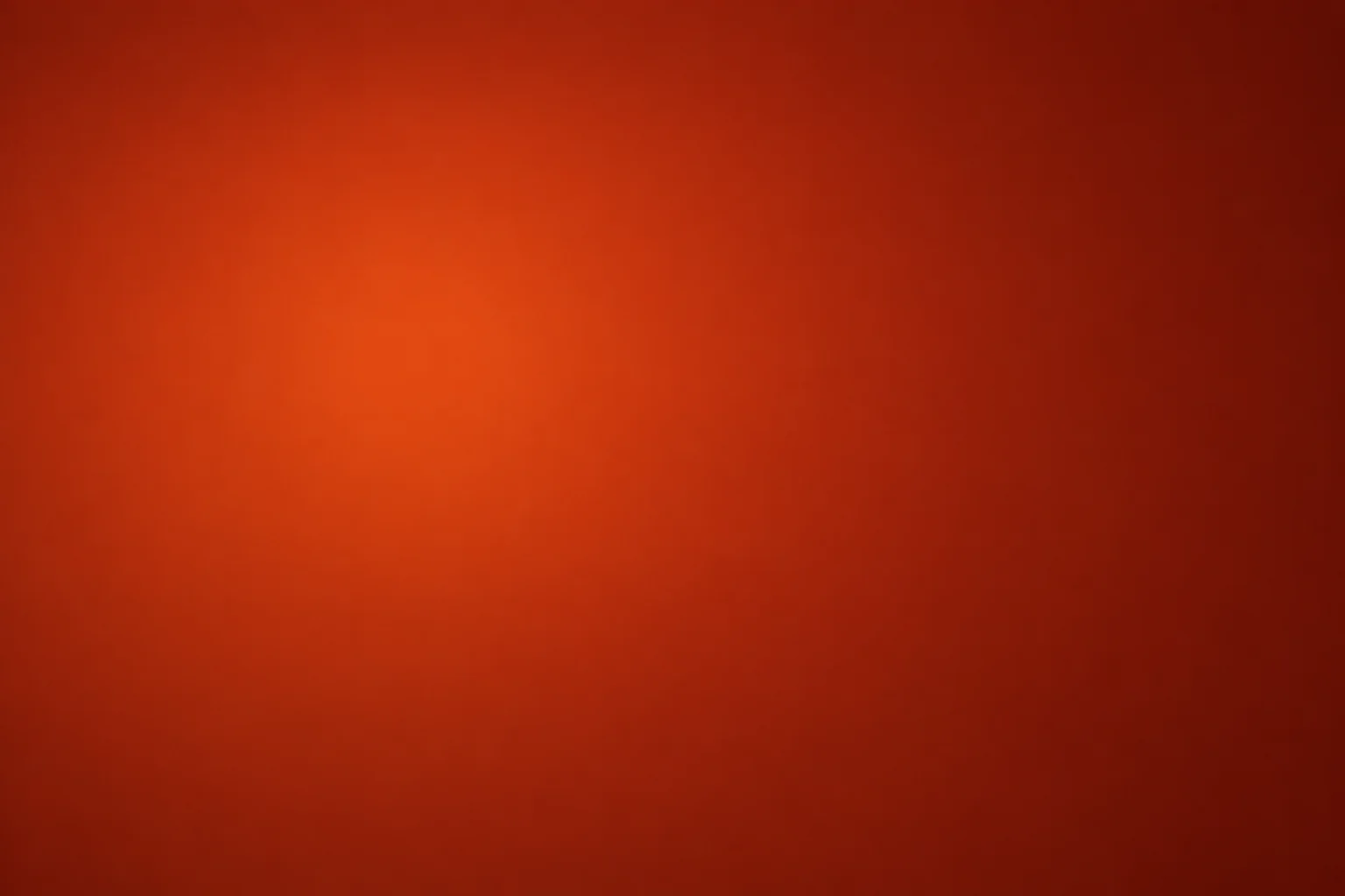 Warm textured background in rich orange hue