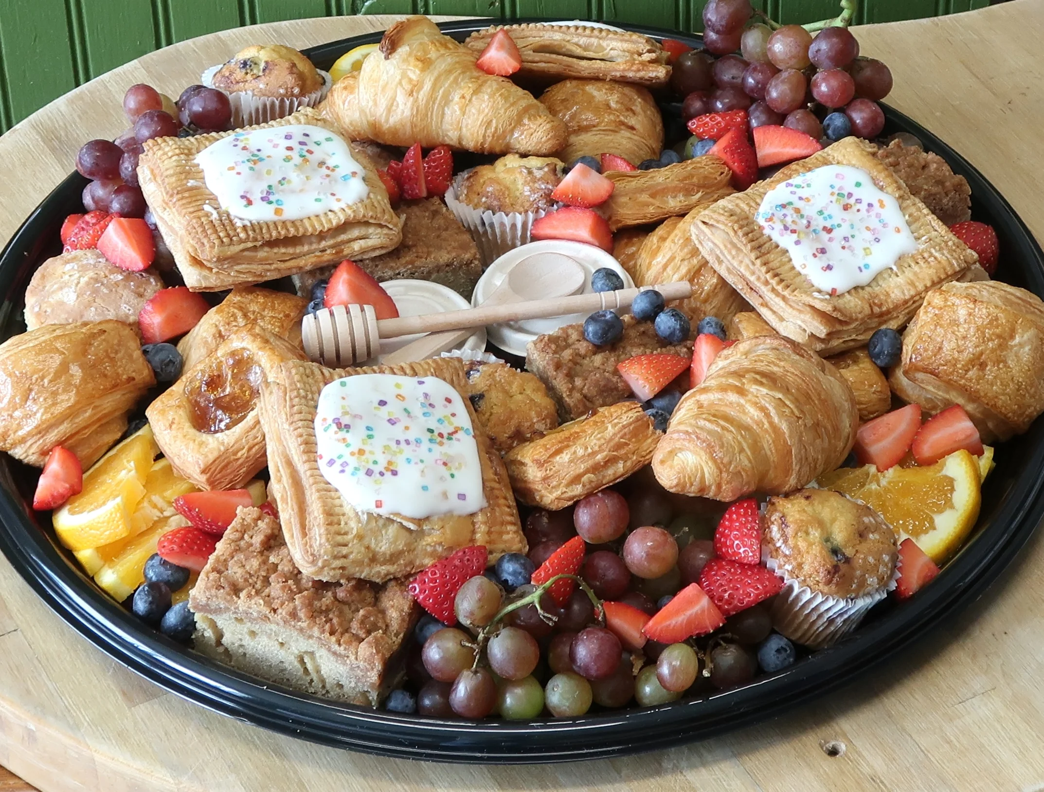 Assorted pastry platter with fruits and sweets for brunch
