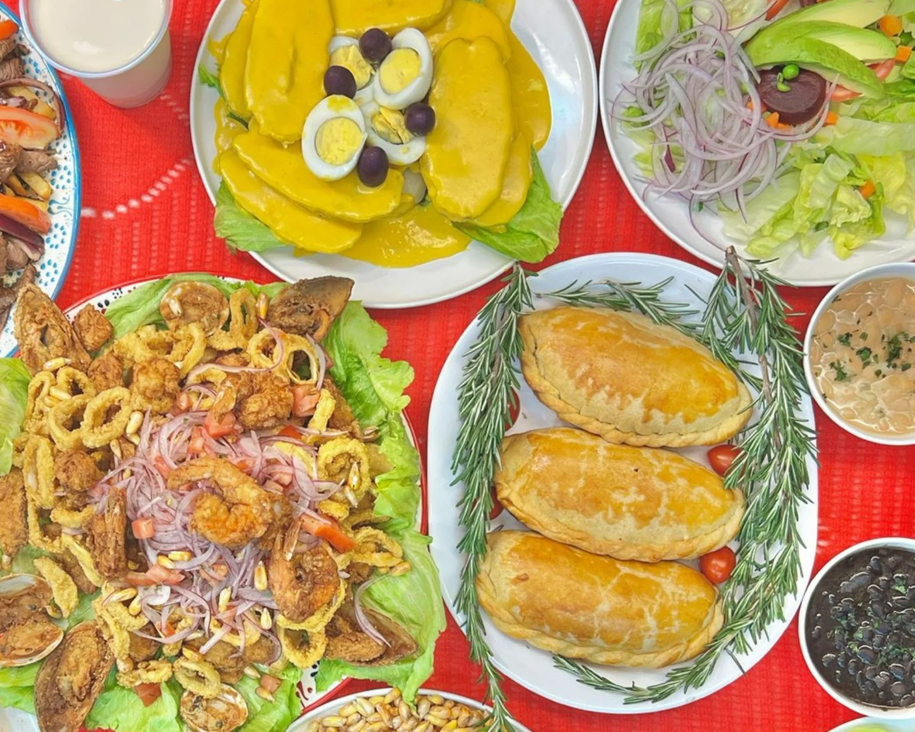 Assorted Latin American dishes on a vibrant table setting