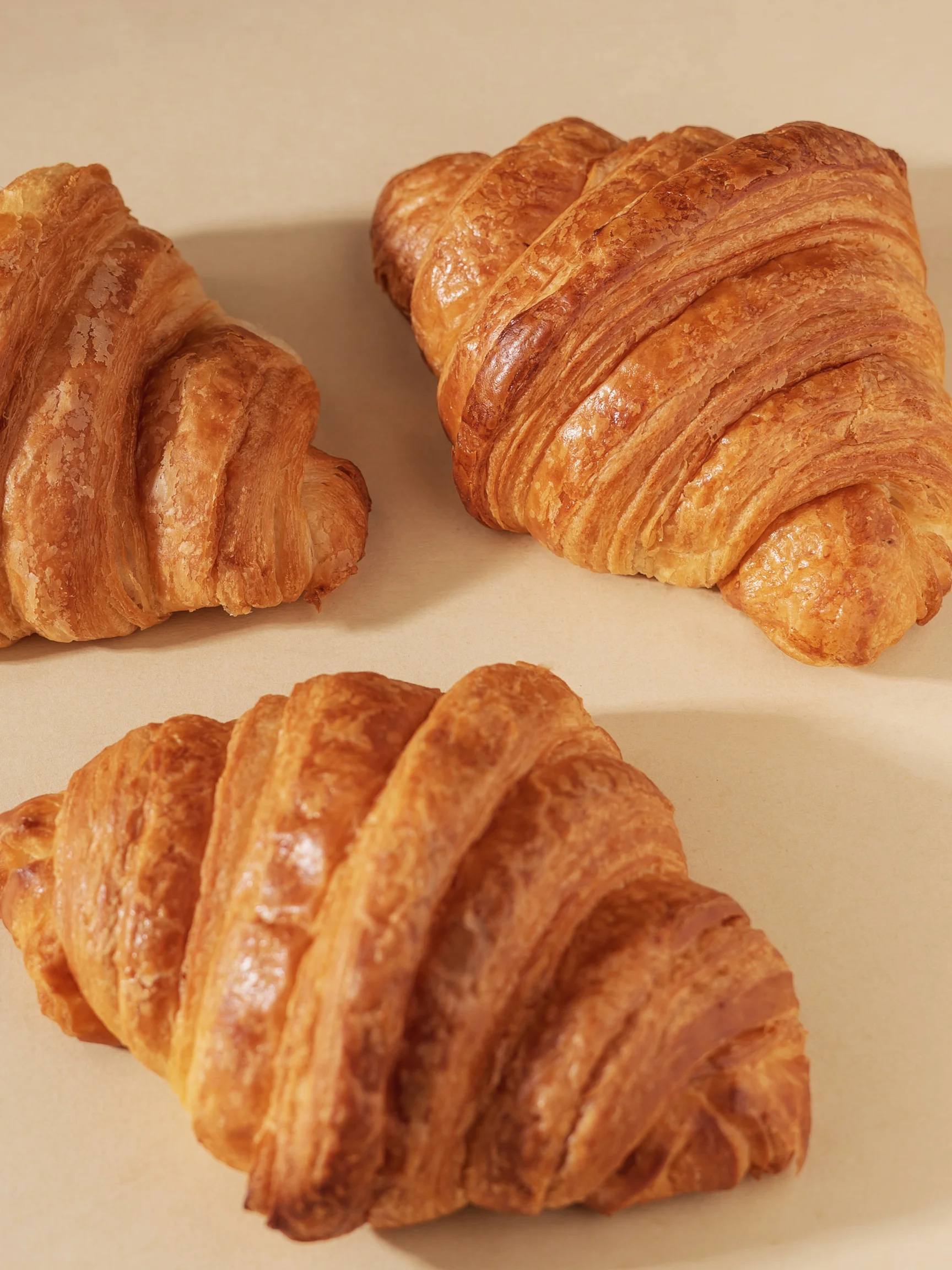 Freshly baked croissant on a white background