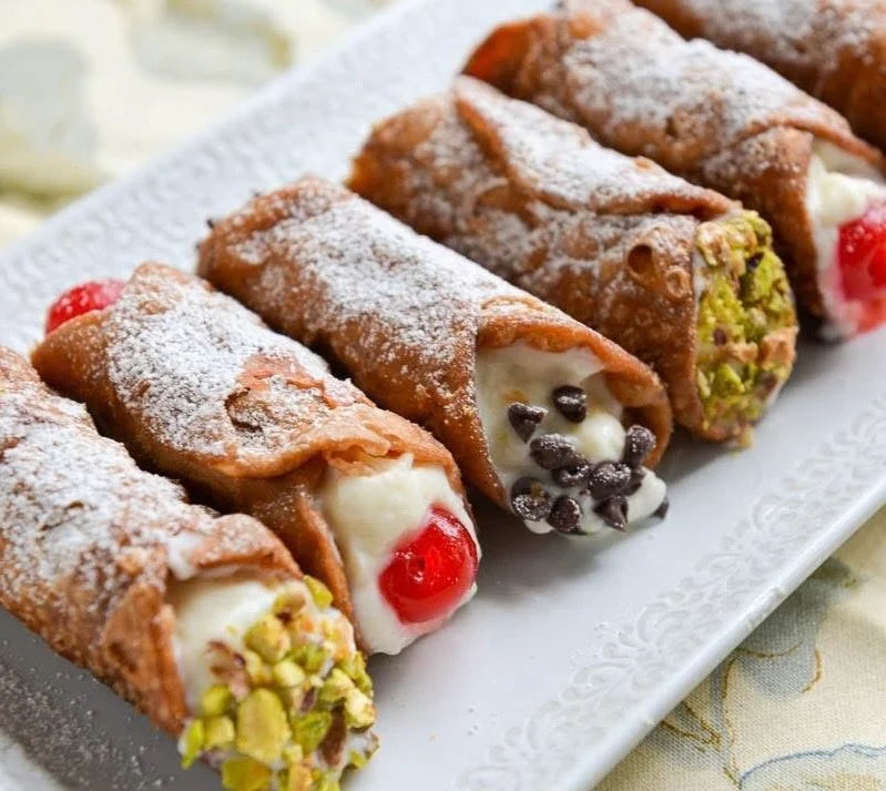 Italian cannoli filled with sweet ricotta cream