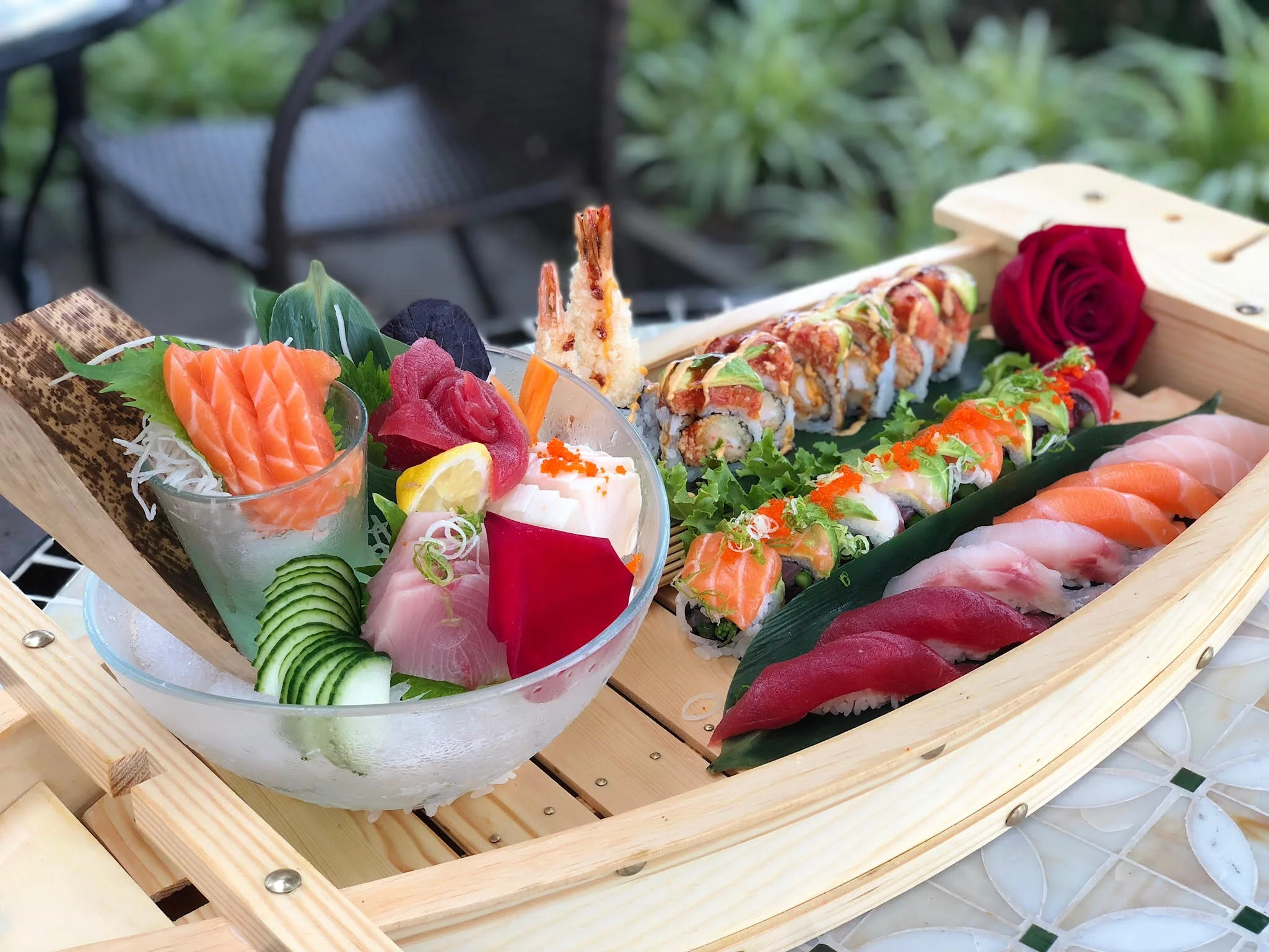 Japanese sushi platter with sashimi and rolls