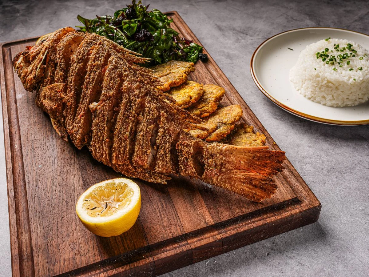 Juicy tomahawk steak served on a wooden board